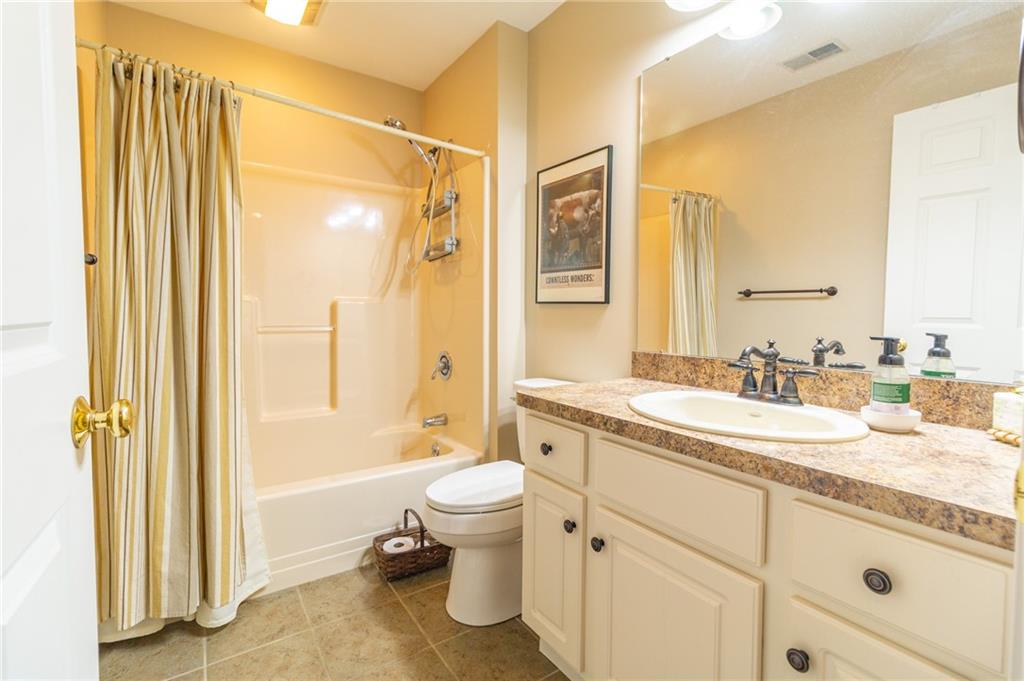 138 Abbey Road New Castle, PA 16105 - Photo 30 of 36 a spacious bathroom with a granite countertop sink toilet and shower