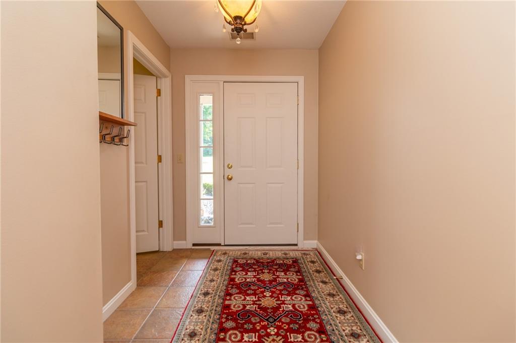 138 Abbey Road New Castle, PA 16105 - Photo 3 of 36 a view of hallway with wooden floor