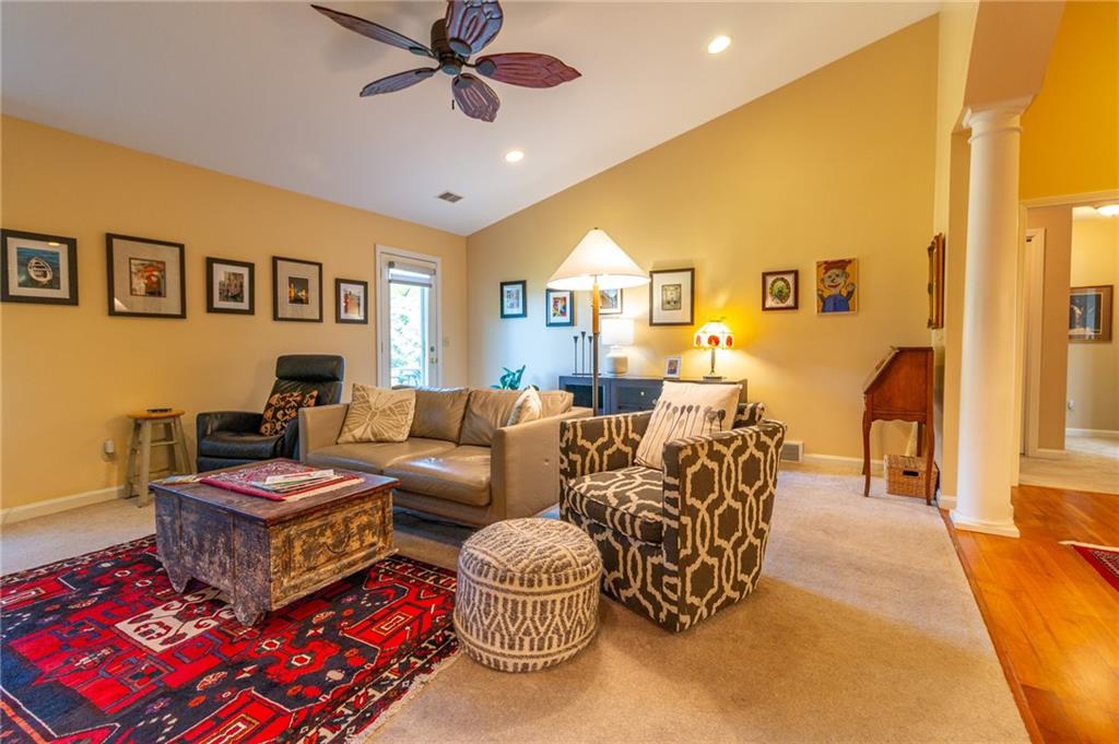 138 Abbey Road New Castle, PA 16105 - Photo 6 of 36 a living room with a couch and a chandelier