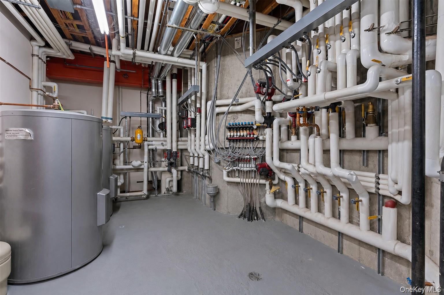 660 Chicken Valley Road Locust Valley, NY 11560 - Photo 40 of 48 Utility room showcasing extensive plumbing and mechanical systems