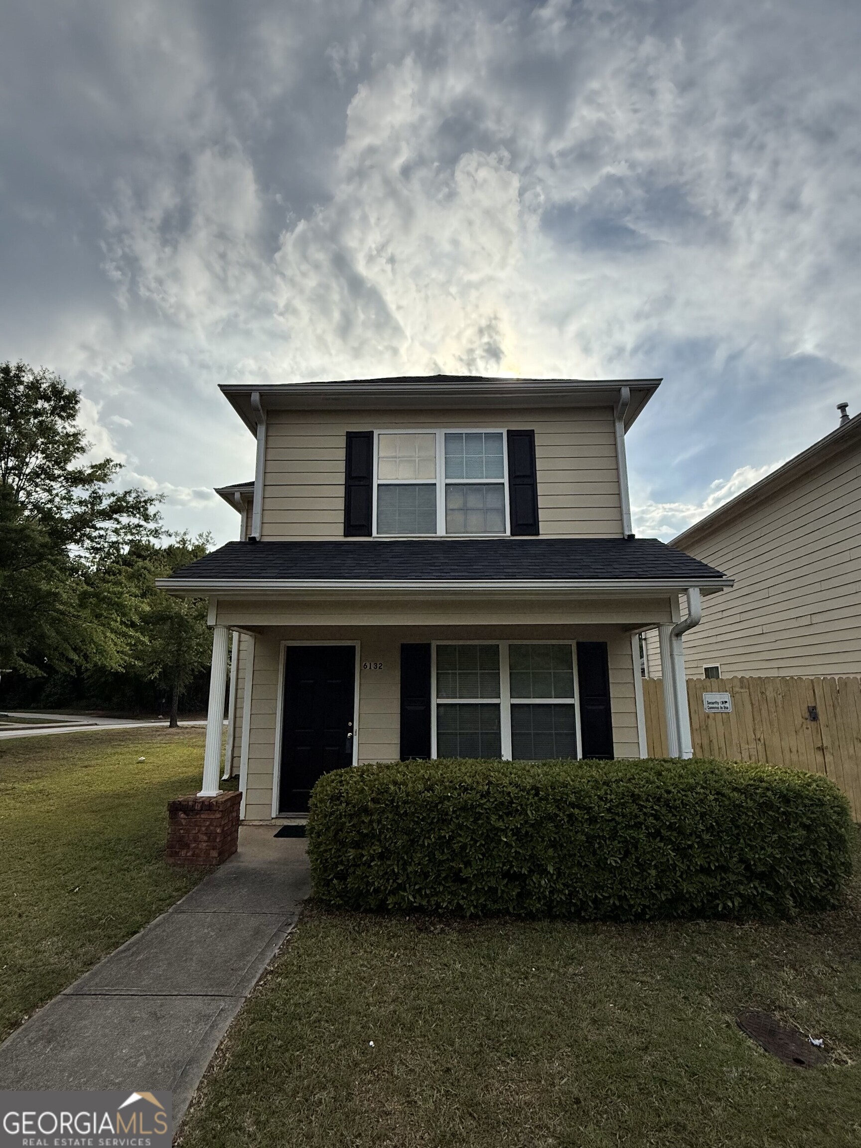 6132 Ruth Street Southwest Covington, GA 30014 - Photo 33 of 33 a front view of a house with a garden