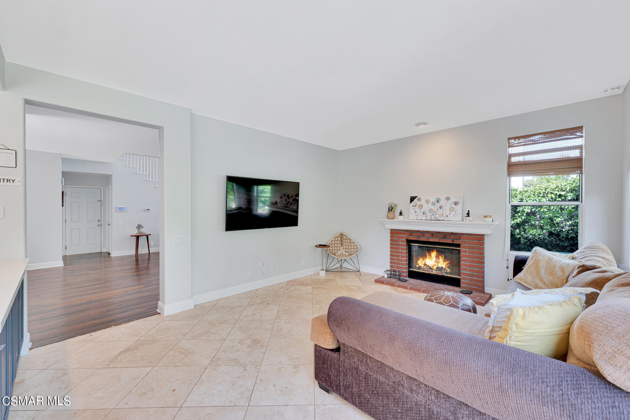 3930 Sunsetridge Road Moorpark, CA 93021 - Photo 16 of 42 a living room with furniture and a fireplace