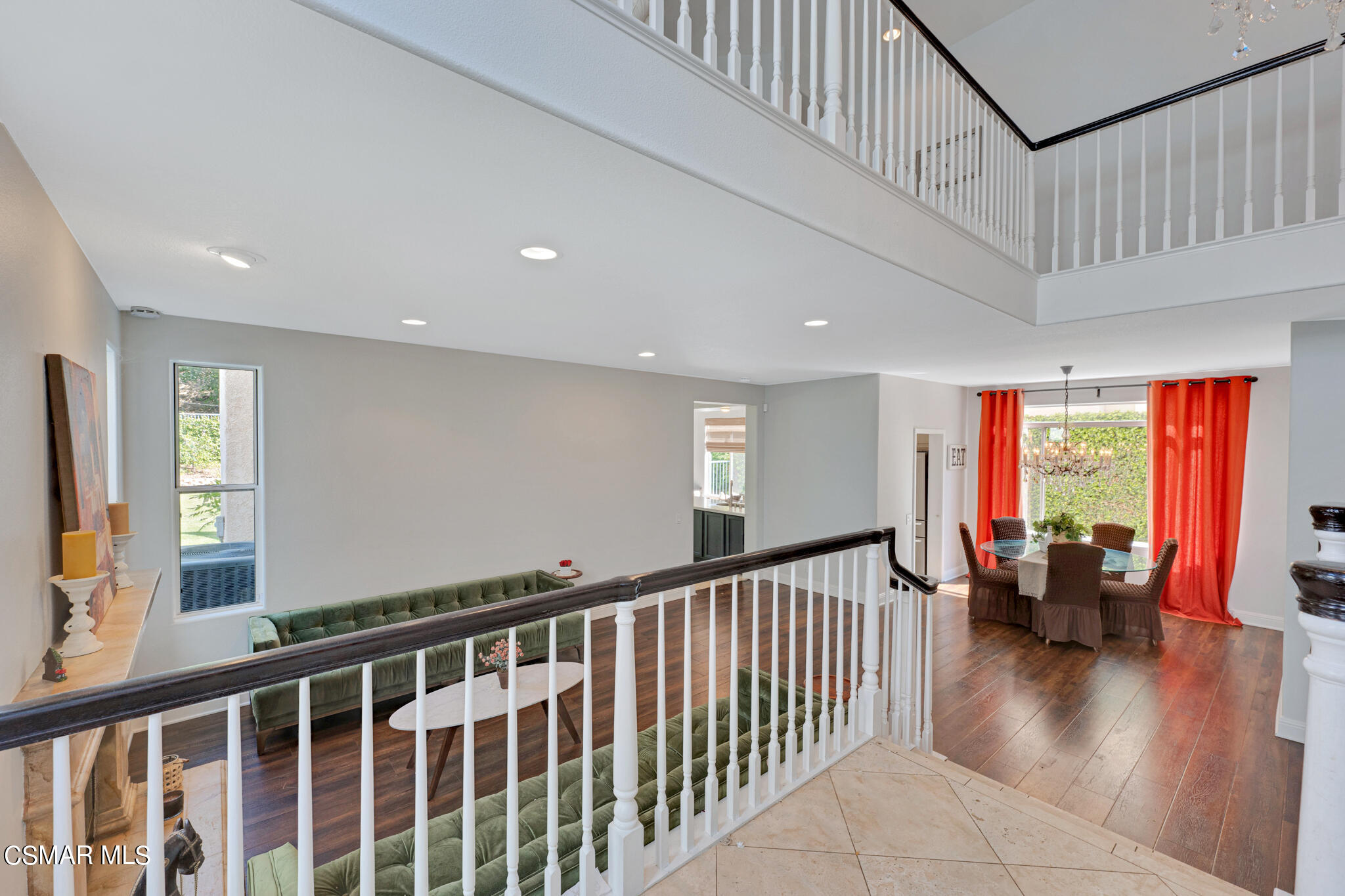 3930 Sunsetridge Road Moorpark, CA 93021 - Photo 17 of 42 a view of a livingroom with furniture stairs windows and a chandelier