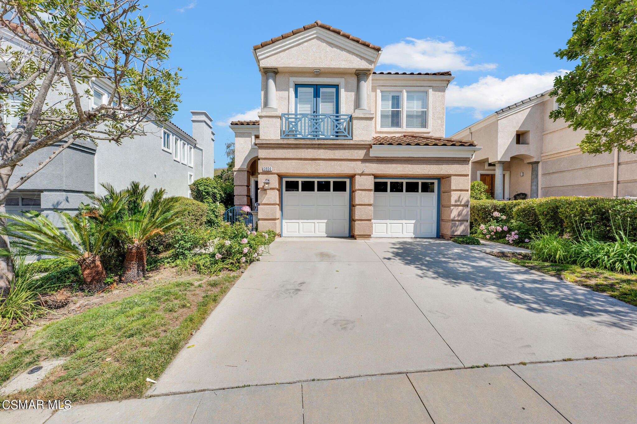 3930 Sunsetridge Road Moorpark, CA 93021 - Photo 2 of 42 a front view of a house with a garden