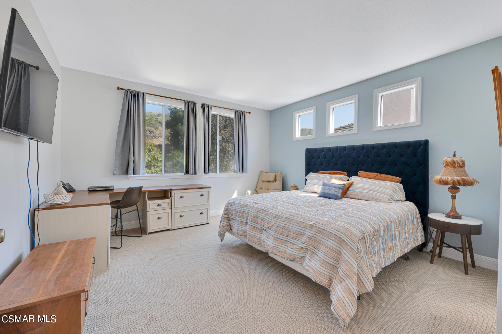 3930 Sunsetridge Road Moorpark, CA 93021 - Photo 26 of 42 a bedroom with a bed and a dresser in it