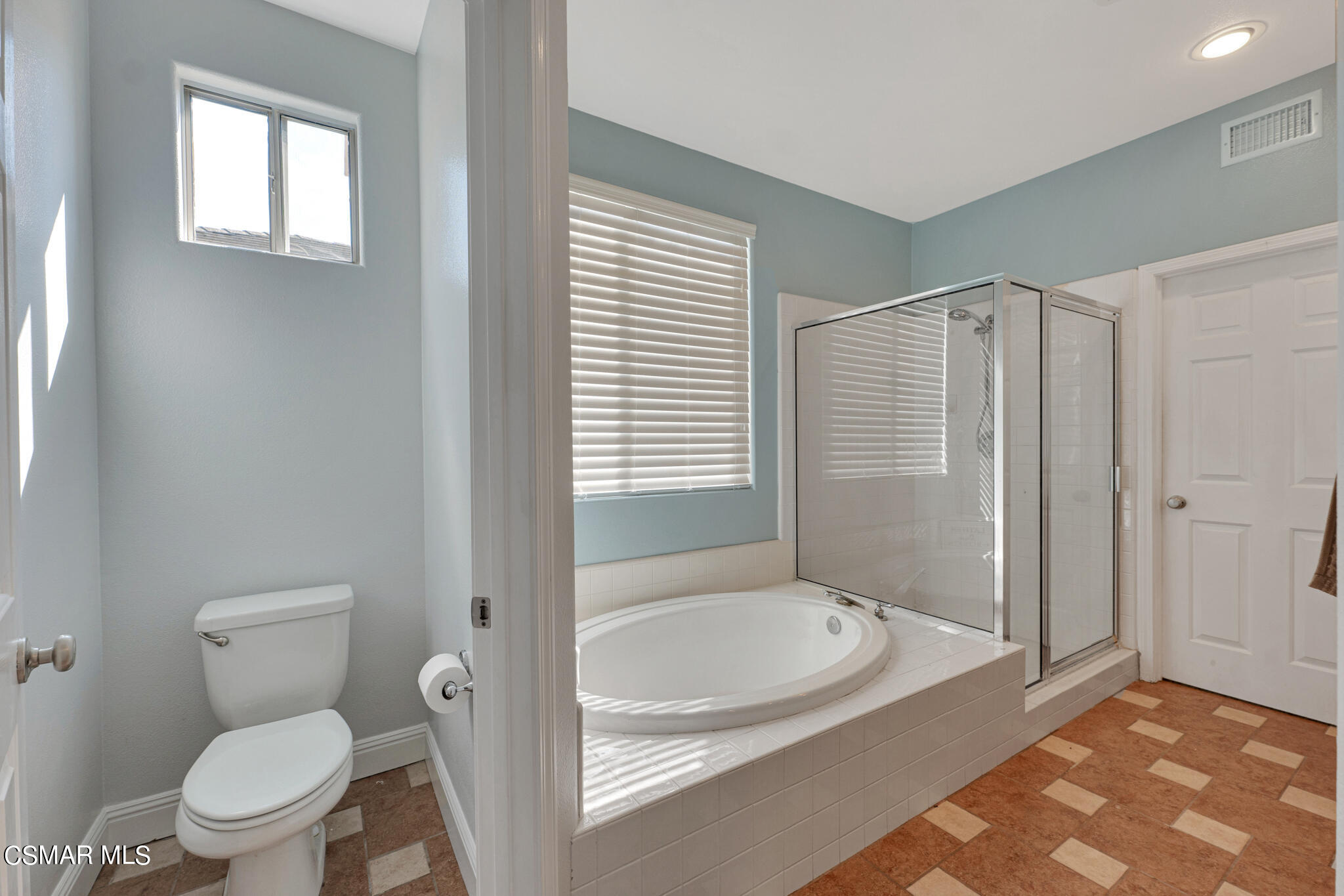 3930 Sunsetridge Road Moorpark, CA 93021 - Photo 28 of 42 a bathroom with a sink toilet and shower