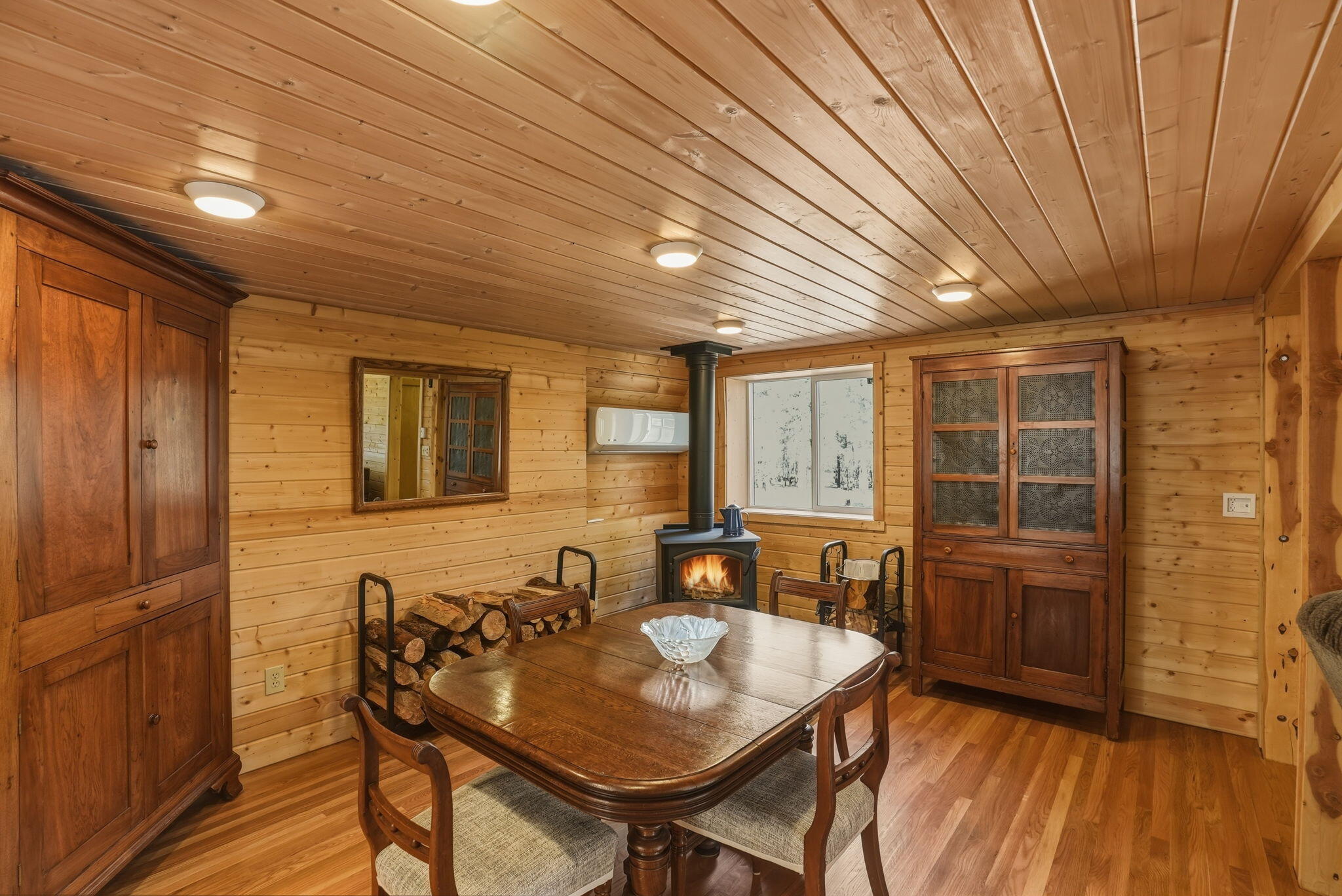 15020 Remuda Road Sisters, OR 97759 - Photo 15 of 61 Dining Area with Wood Stove