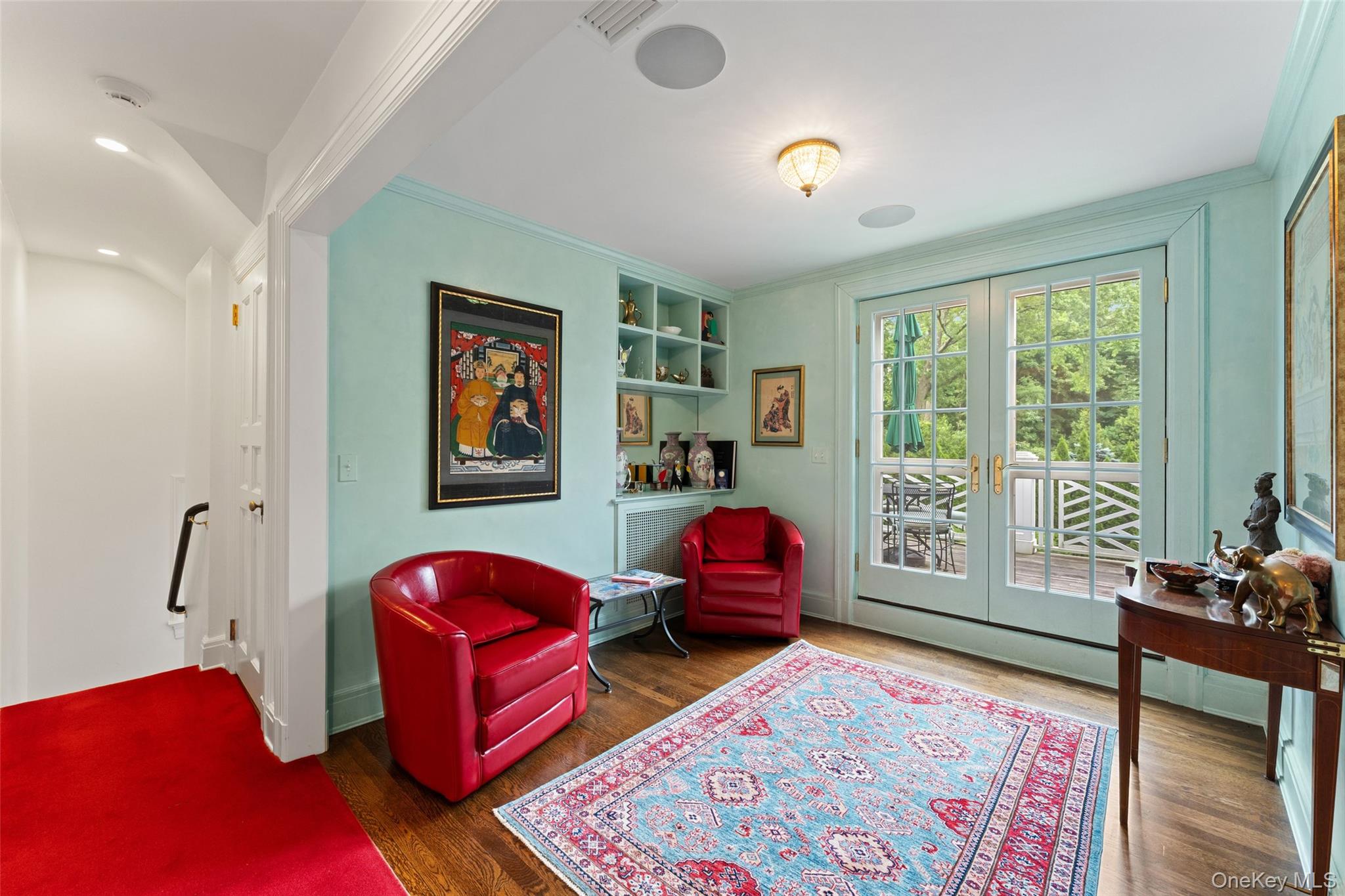 21 Dolma Road Scarsdale, NY 10583 - Photo 31 of 46 Sitting Room with french doors to second floor deck overlooking grounds
