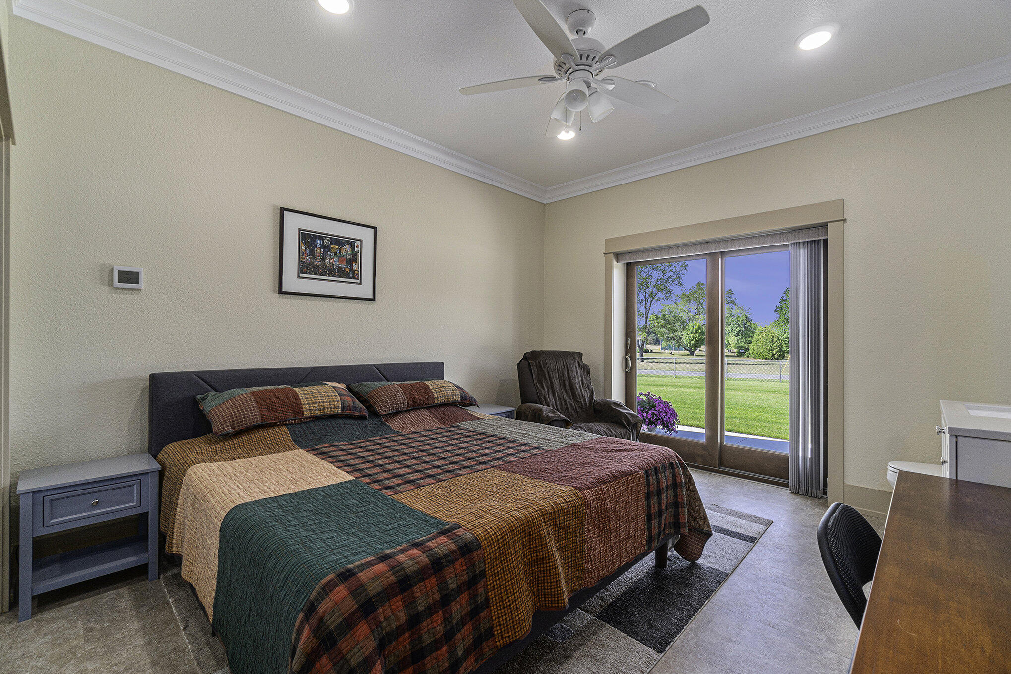 5859 Potter Road Onekama, MI 49675 - Photo 29 of 85 Bedroom # 2 has sliding doors
