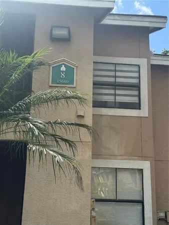 wooden floor with a white walls