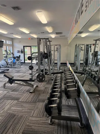 a view of a room with gym equipment
