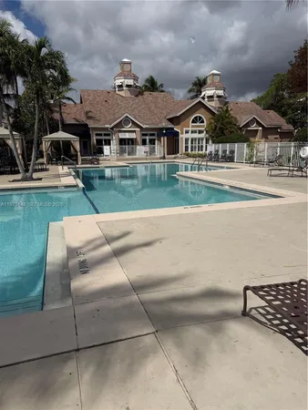 a view of multiple houses with a yard