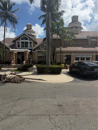 a city street lined with buildings and cars