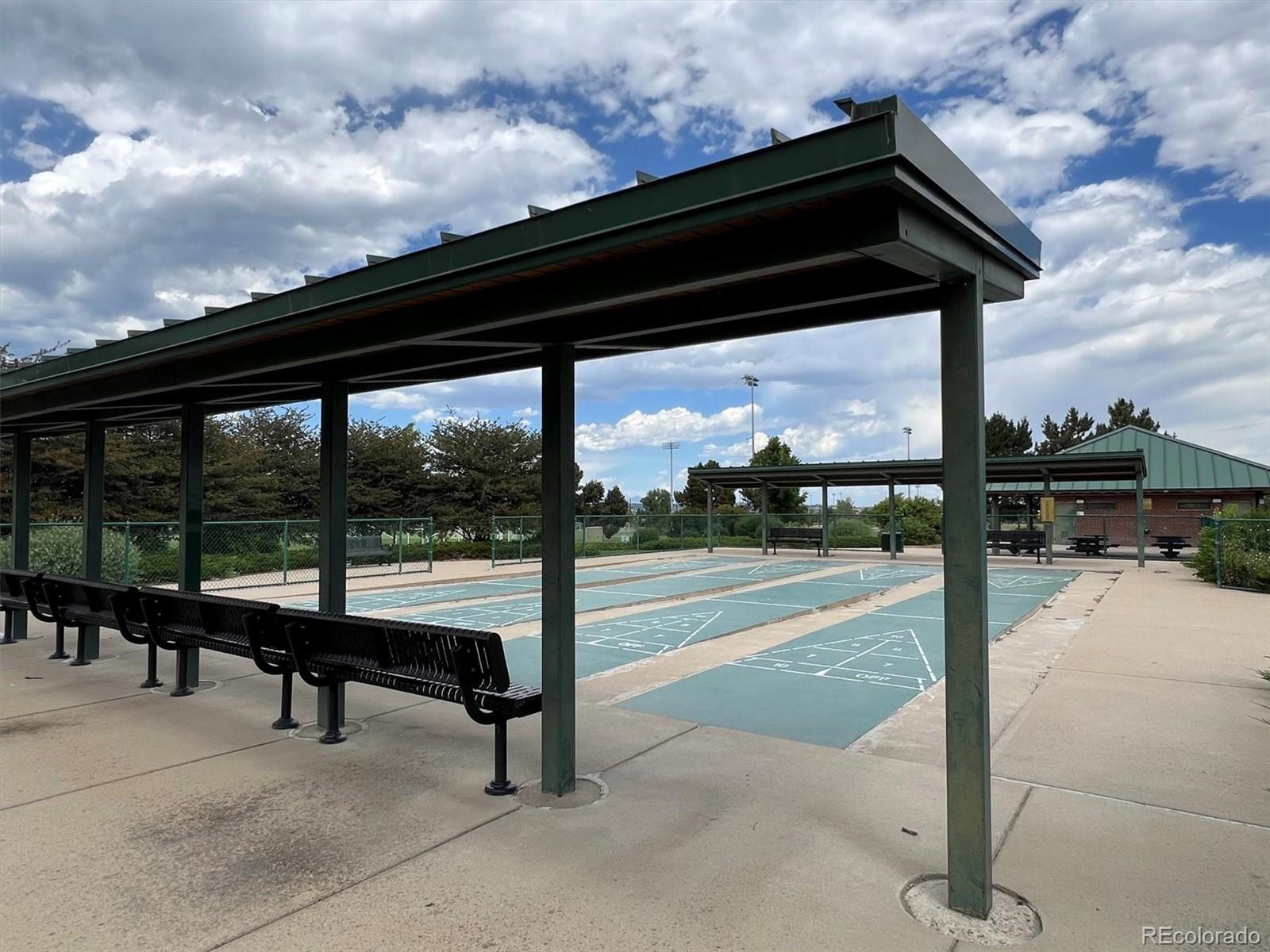5250 South Huron Way, Unit 7104 Littleton, CO 80120 - Photo 16 of 19 a view of swimming pool from a patio