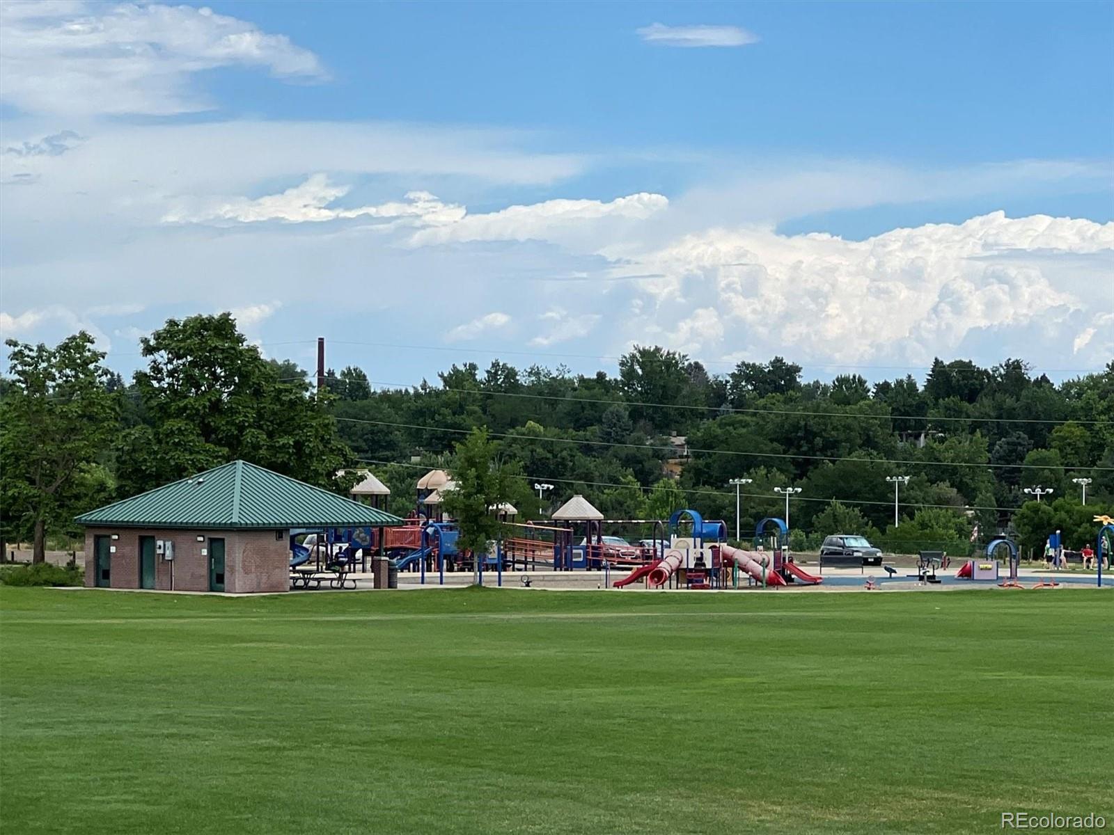 5250 South Huron Way, Unit 7104 Littleton, CO 80120 - Photo 19 of 19 a view of outdoor space with green field and trees