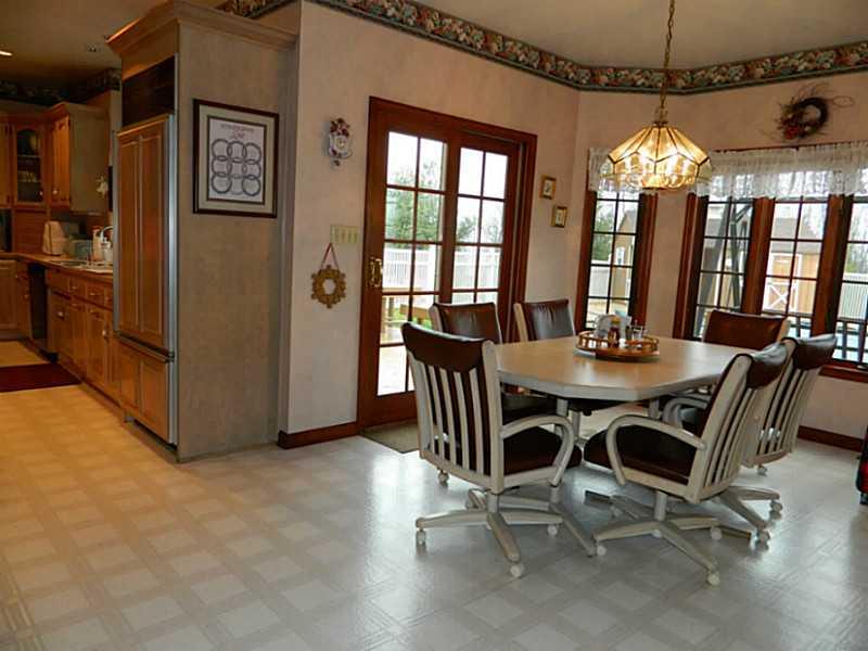 318 Quarry Road Washington, PA 15301 - Photo 13 of 25 Exterior Front. The kitchen dining area is very spacious and can accommodate a very large dining table. Walls of windows as well as a sliding door offers a great view of the pool area.