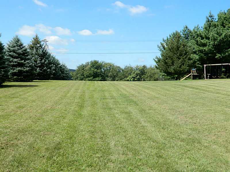318 Quarry Road Washington, PA 15301 - Photo 23 of 25 Exterior Front. The yard is gorgeous and is practically level!