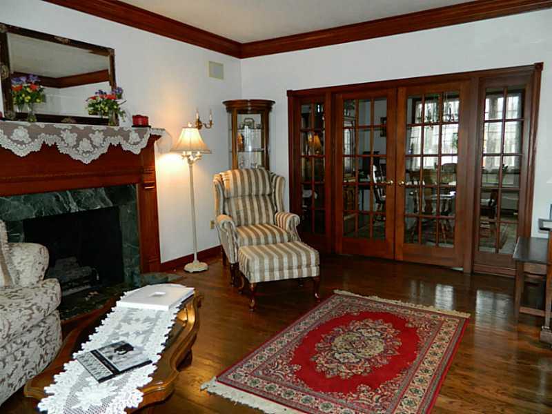 318 Quarry Road Washington, PA 15301 - Photo 7 of 25 Exterior Front. The living room is adjacent to the dining room separated by glass paned French doors and stationery panels for flow throughout the lower level.