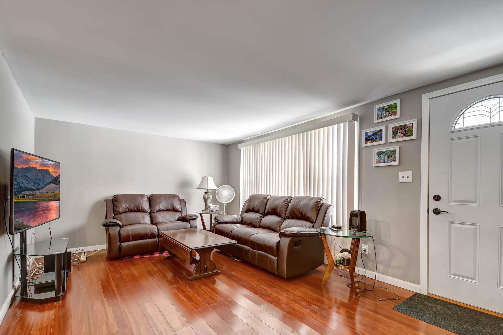 15047 Copter Lane Romeoville, IL 60446 - Photo 3 of 18 a living room with furniture and a flat screen tv