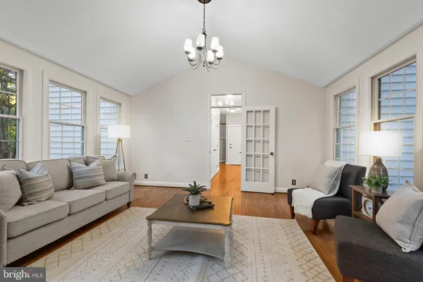 a work room with furniture and a window
