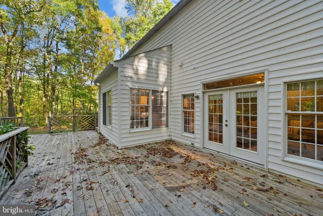 a view of a brick building next to a yard