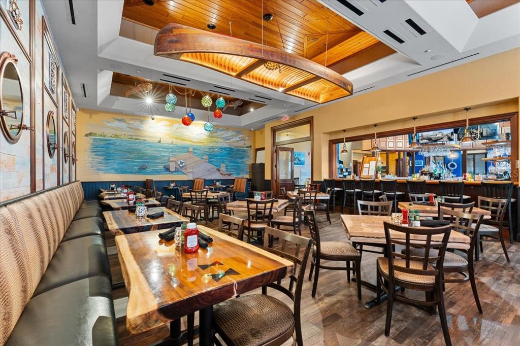 102 Riviera Dunes Way, Unit S36 Palmetto, FL 34221 - Photo 19 of 24 a outdoor dining space with furniture and outdoor view