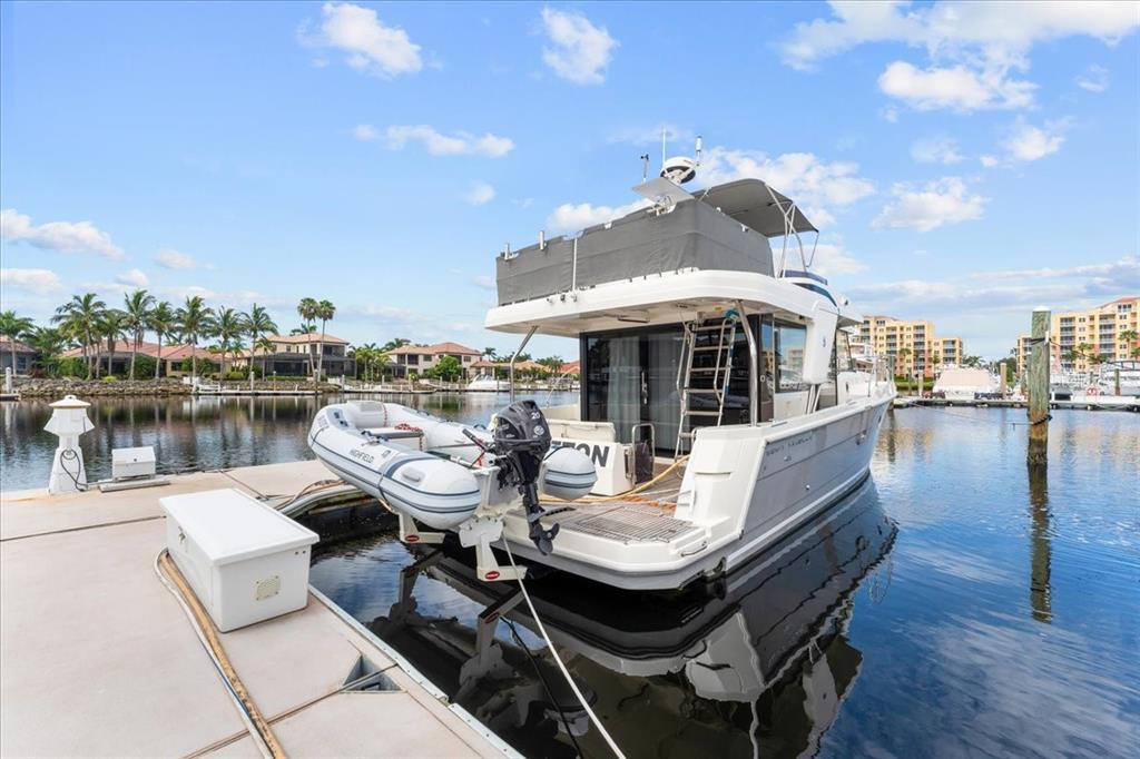 102 Riviera Dunes Way, Unit S36 Palmetto, FL 34221 - Photo 2 of 24 a view of a roof deck with furniture