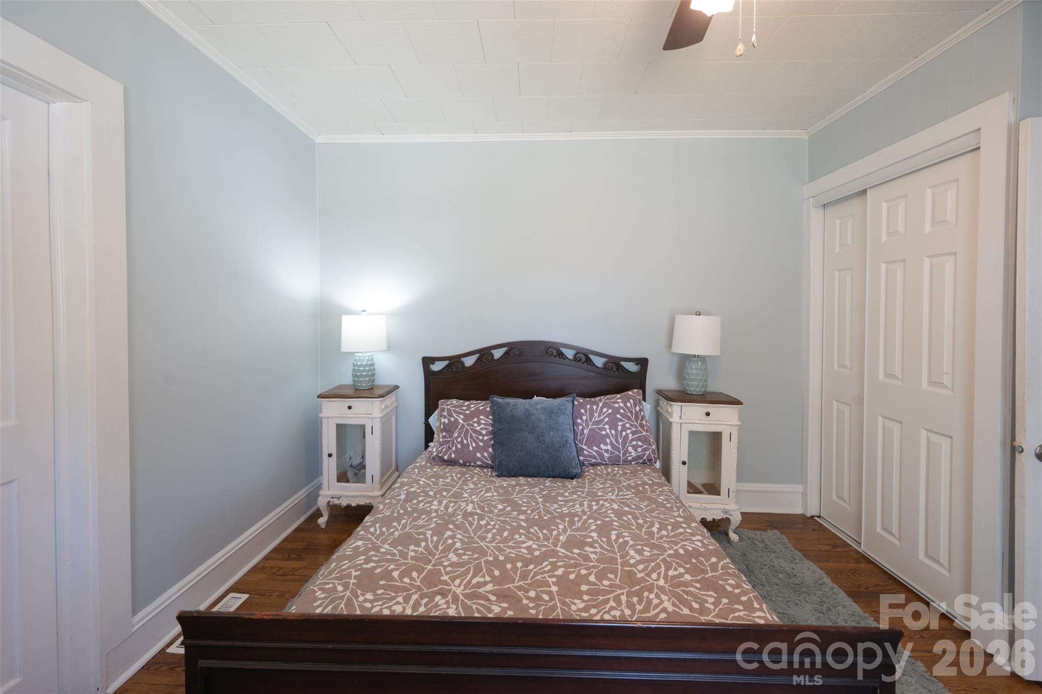 206 Bates Avenue Cherryville, NC 28021 - Photo 16 of 38 a bedroom with a bed and a mirror