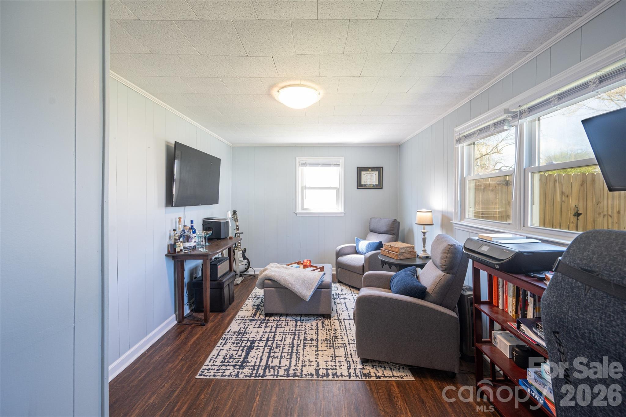 206 Bates Avenue Cherryville, NC 28021 - Photo 27 of 38 a living room with furniture a flat screen tv and a window