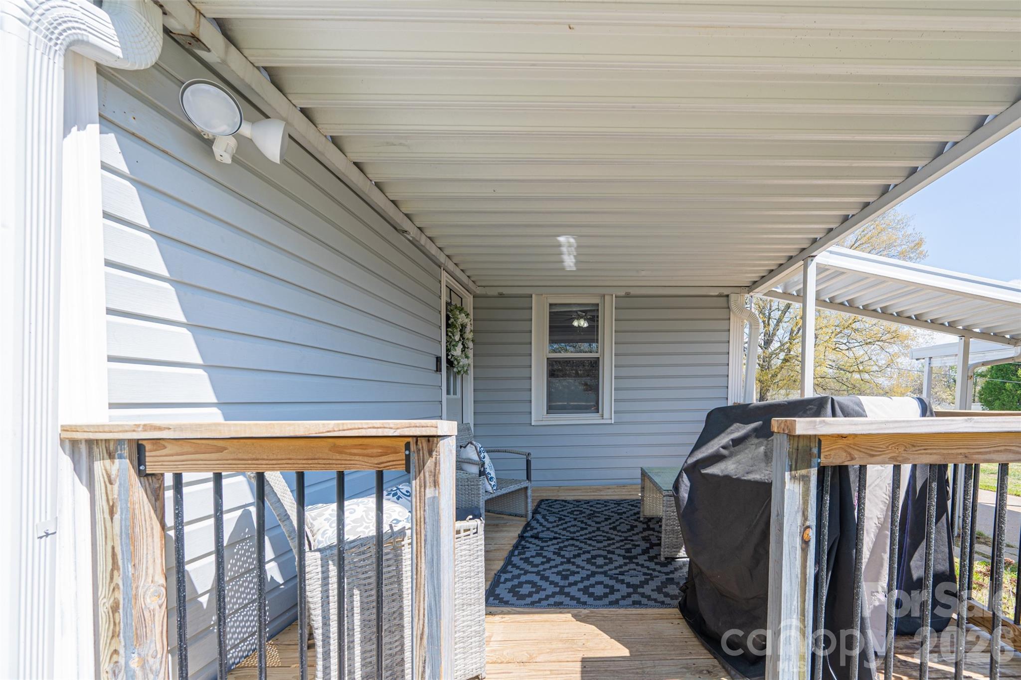 206 Bates Avenue Cherryville, NC 28021 - Photo 34 of 38 a view of a balcony with furniture