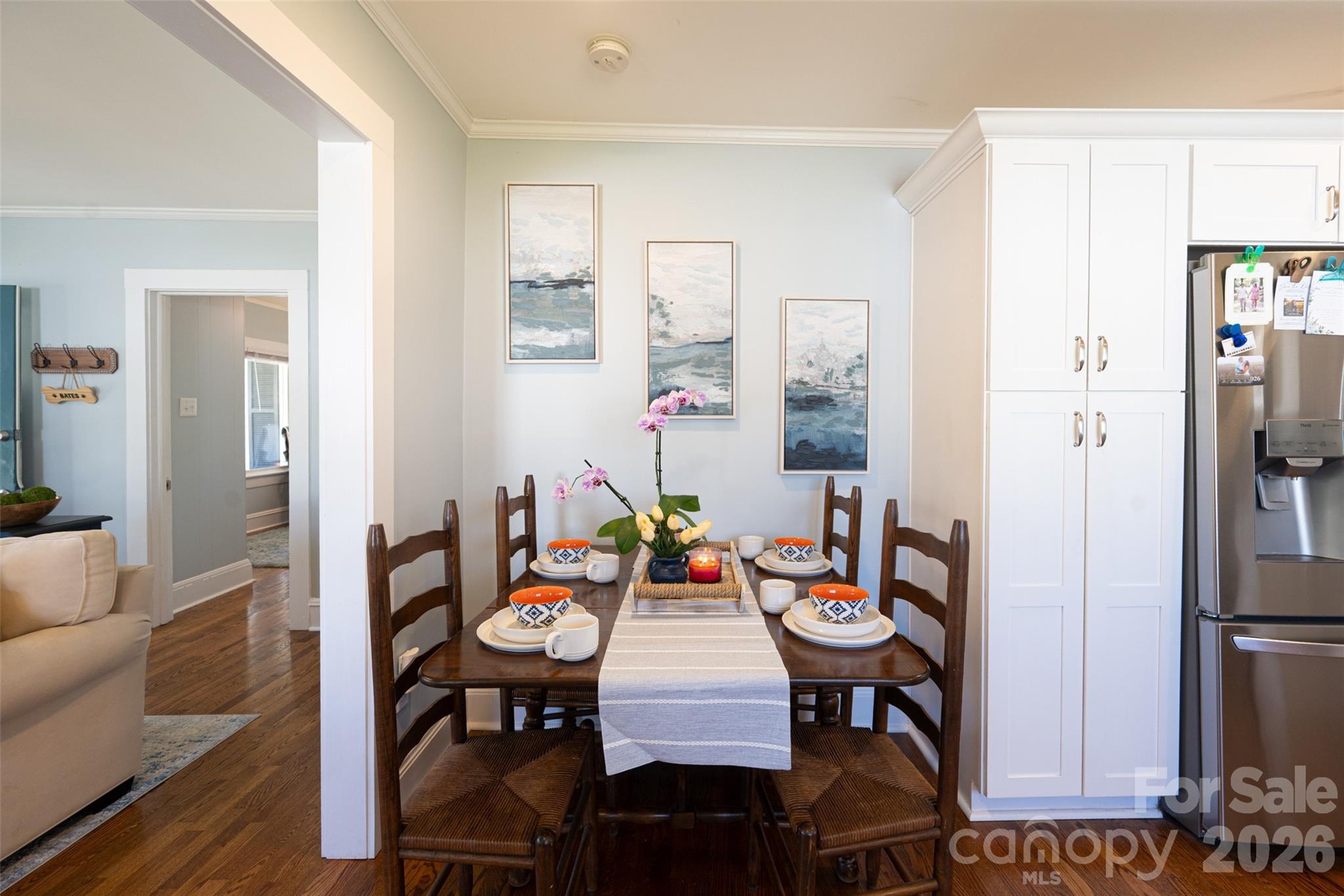 206 Bates Avenue Cherryville, NC 28021 - Photo 10 of 38 a view of a dining room with furniture and wooden floor