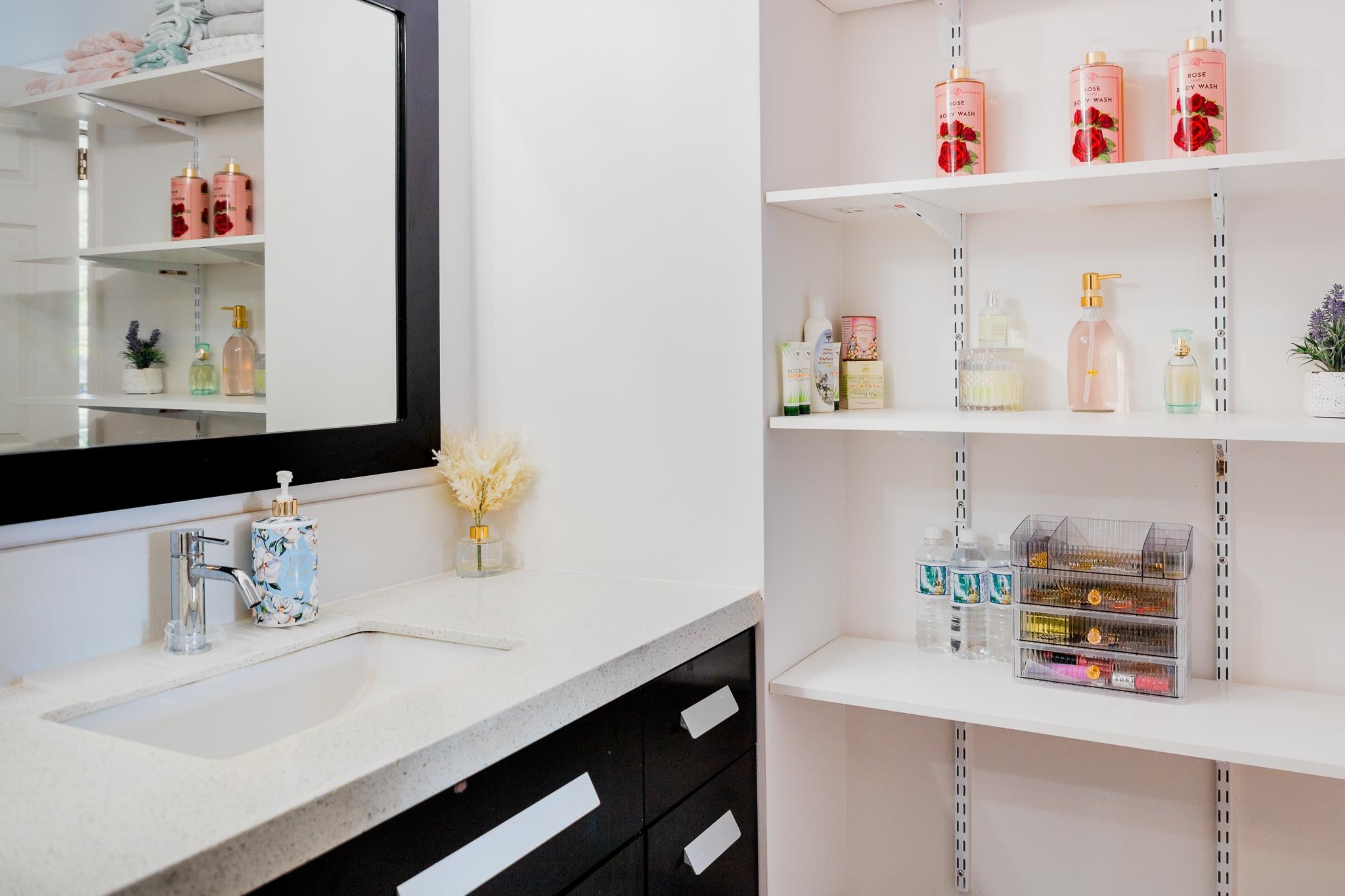 4310 Lower Honoapiilani Road, Unit 302 Lahaina, HI 96761 - Photo 27 of 50 a kitchen with a sink a stove and cabinets