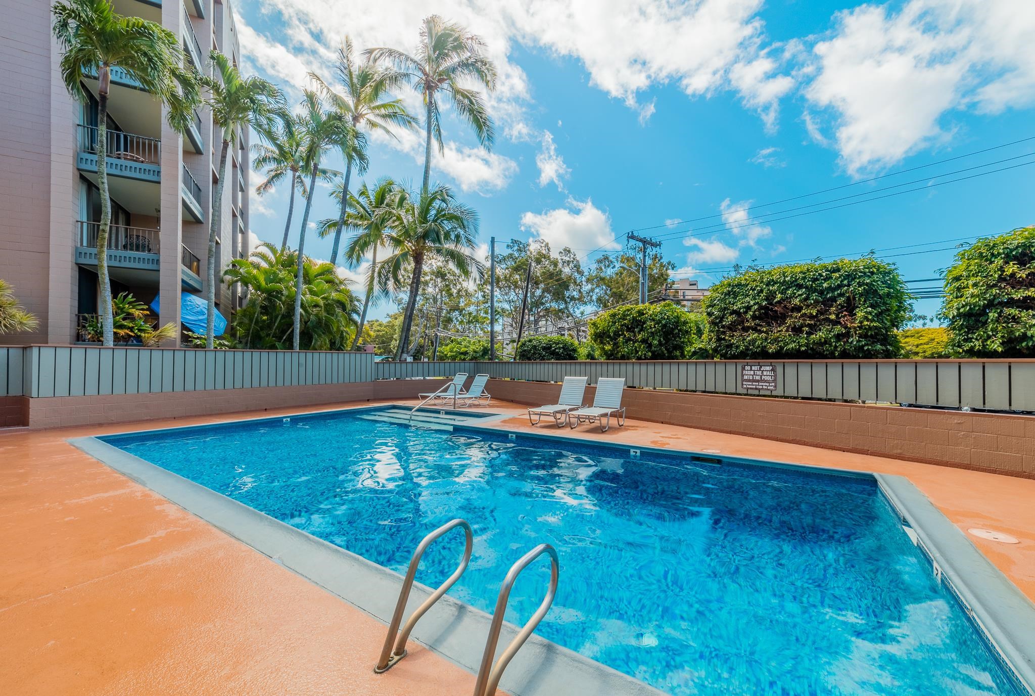 4310 Lower Honoapiilani Road, Unit 302 Lahaina, HI 96761 - Photo 3 of 50 a view of a swimming pool with a yard