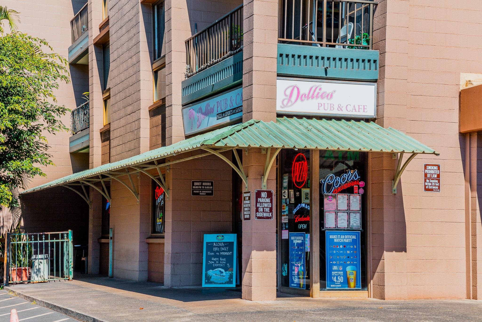 4310 Lower Honoapiilani Road, Unit 302 Lahaina, HI 96761 - Photo 48 of 50 a front view of a building with retail shops
