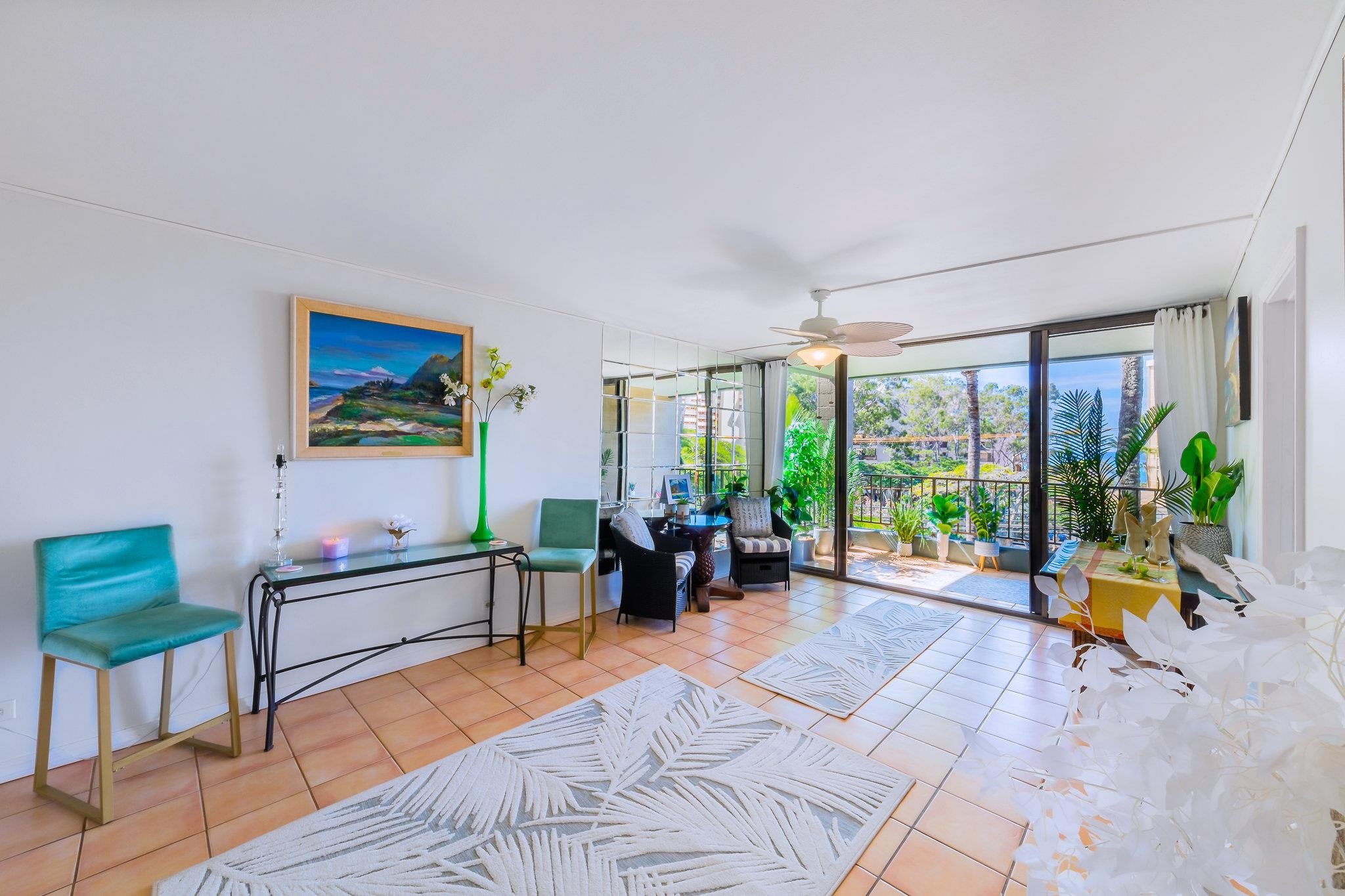 4310 Lower Honoapiilani Road, Unit 302 Lahaina, HI 96761 - Photo 5 of 50 a living room with furniture and large windows