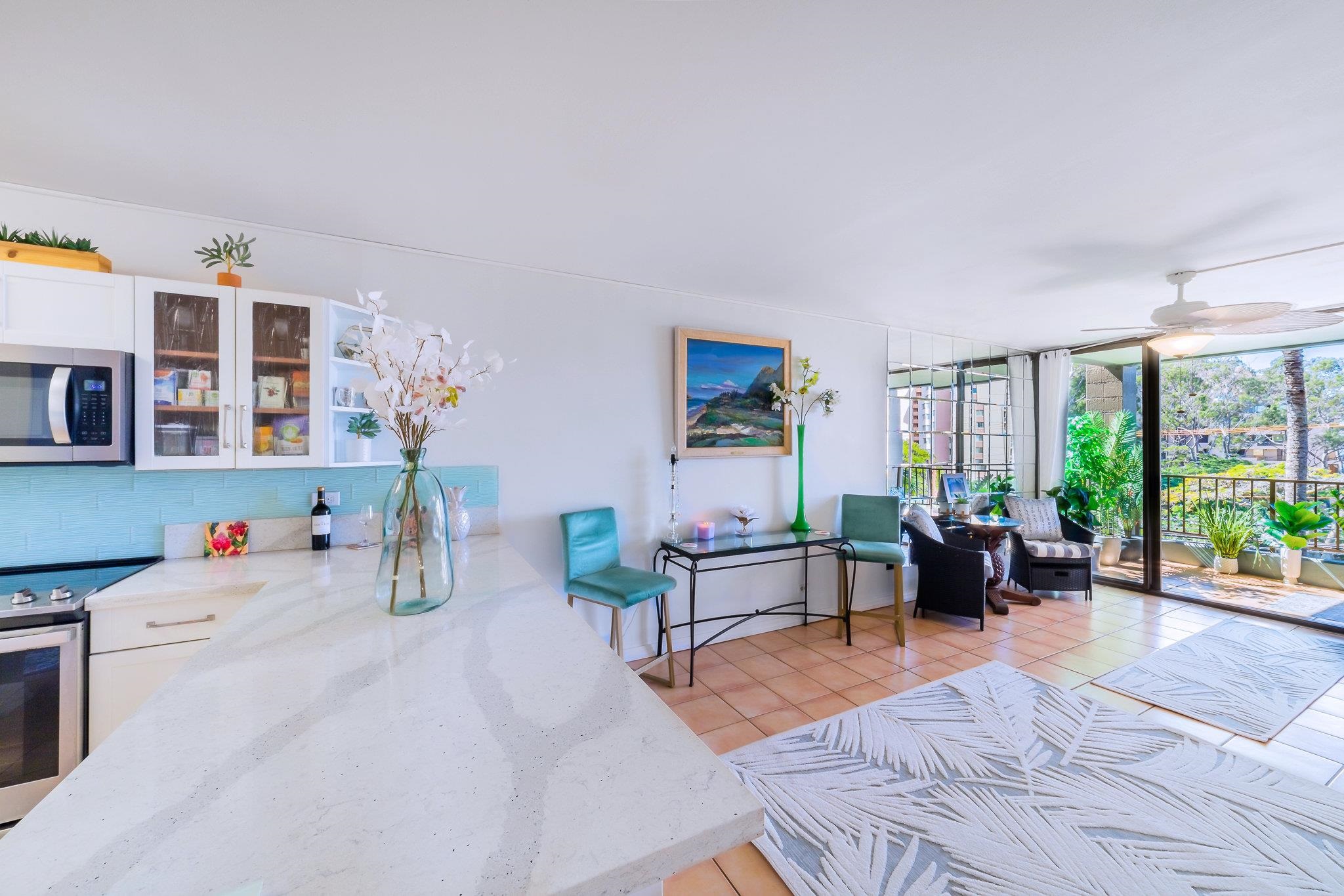 4310 Lower Honoapiilani Road, Unit 302 Lahaina, HI 96761 - Photo 6 of 50 a living room with furniture and large windows