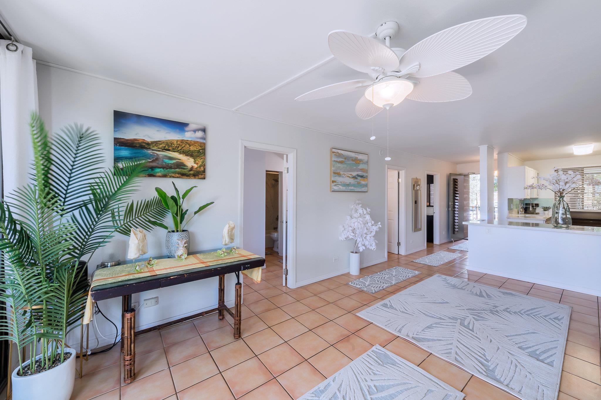 4310 Lower Honoapiilani Road, Unit 302 Lahaina, HI 96761 - Photo 10 of 50 a lobby with furniture and a potted plant