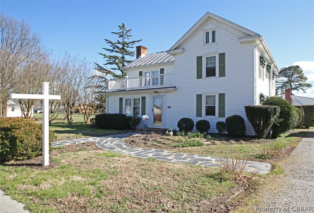 Lovely curb appeal with nice walkways & landscaping