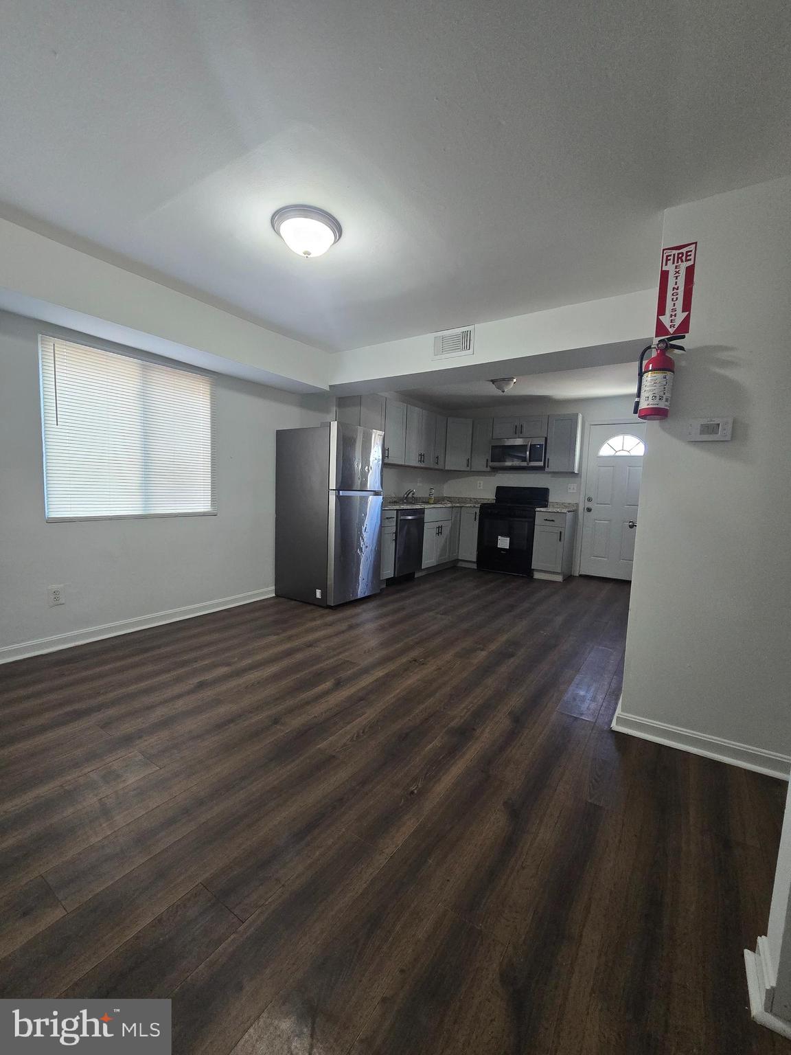 520 56th Street Northeast Washington, DC 20019 - Photo 11 of 15 a view of a livingroom with furniture and wooden floor