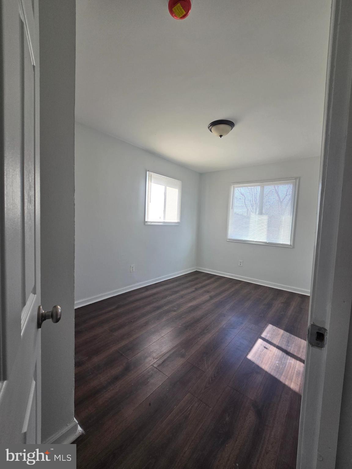 520 56th Street Northeast Washington, DC 20019 - Photo 13 of 15 an empty room with windows