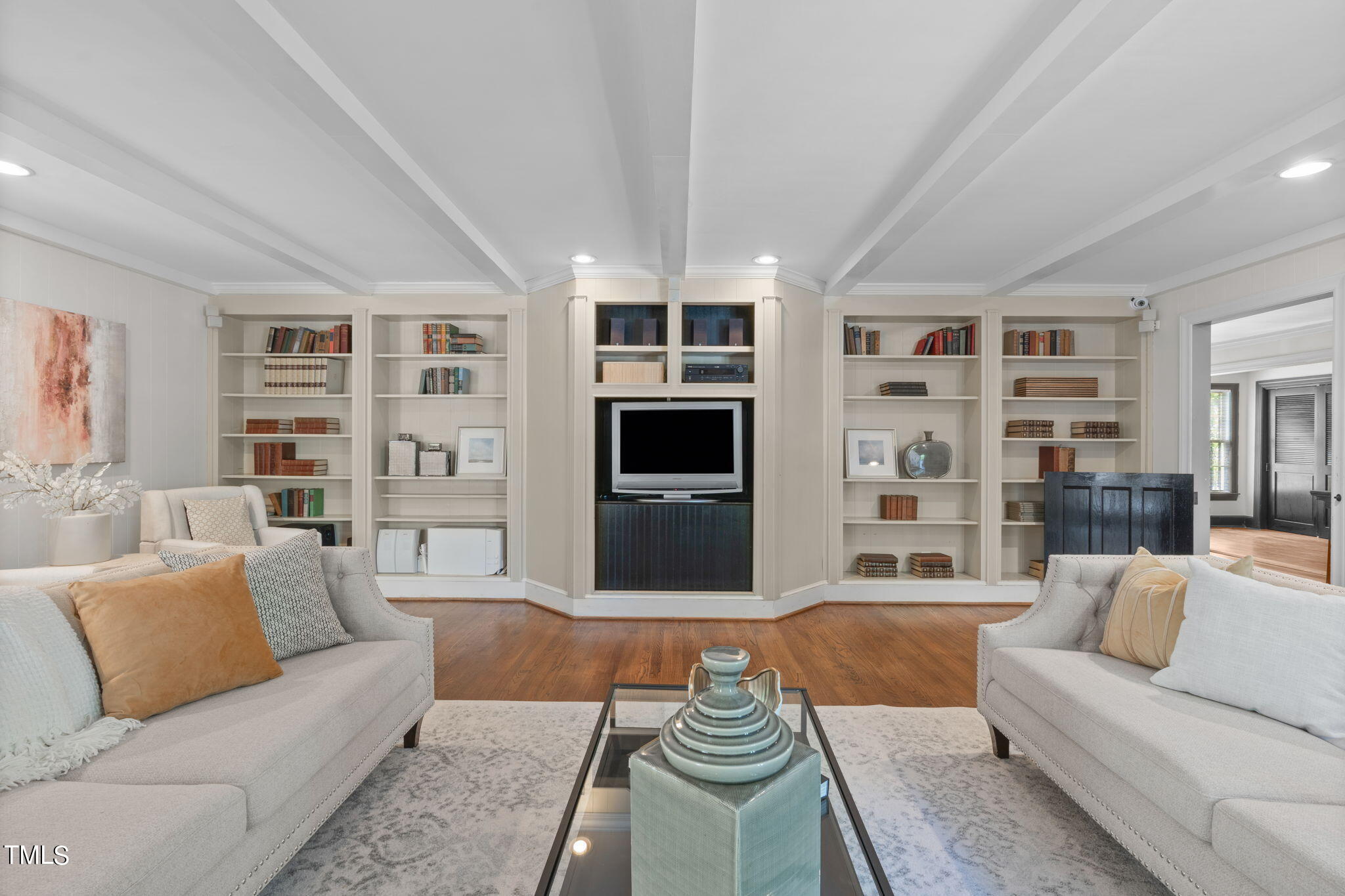 3919 Regent Road Durham, NC 27707 - Photo 19 of 87 a living room with furniture and a flat screen tv