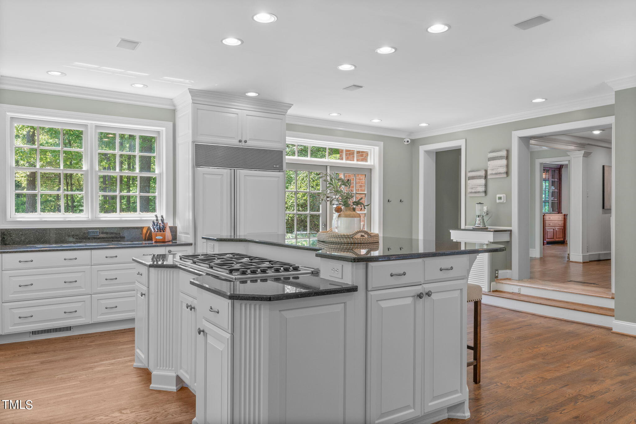 3919 Regent Road Durham, NC 27707 - Photo 24 of 87 a kitchen with stainless steel appliances granite countertop a stove and a sink