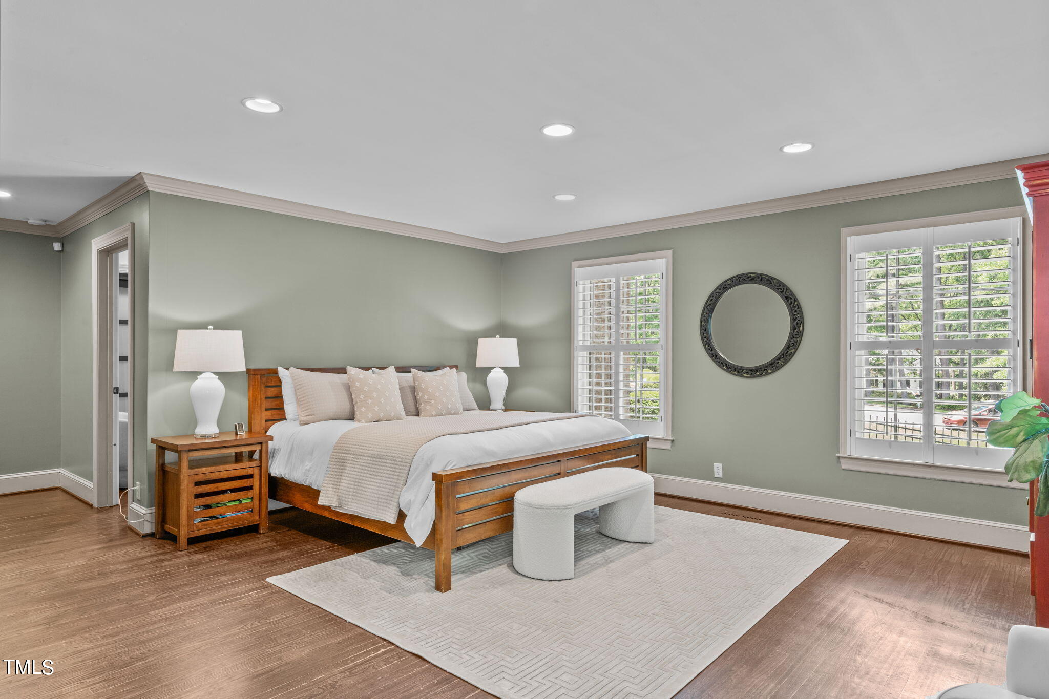 3919 Regent Road Durham, NC 27707 - Photo 33 of 87 a bedroom with a large bed and a large window