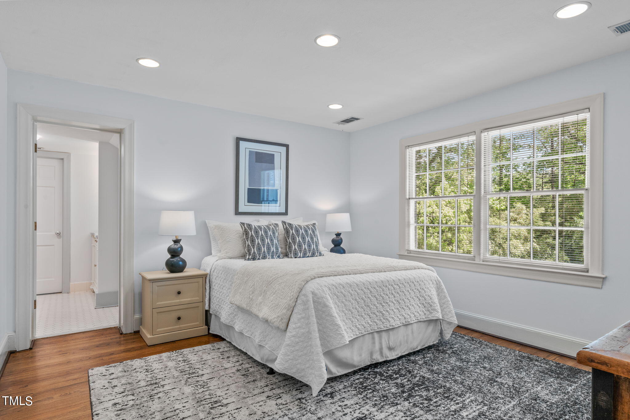 3919 Regent Road Durham, NC 27707 - Photo 45 of 87 a bedroom with a large bed and a window