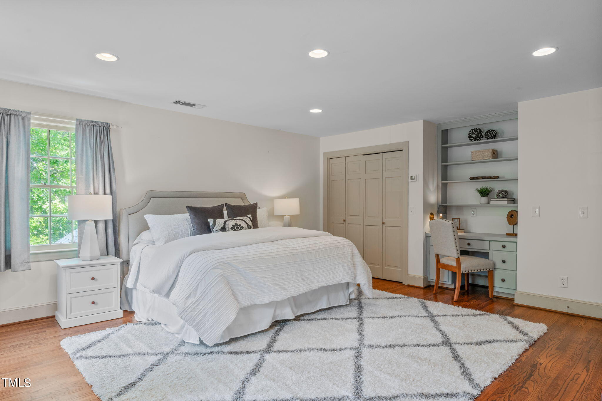 3919 Regent Road Durham, NC 27707 - Photo 49 of 87 a bedroom with a bed and a window
