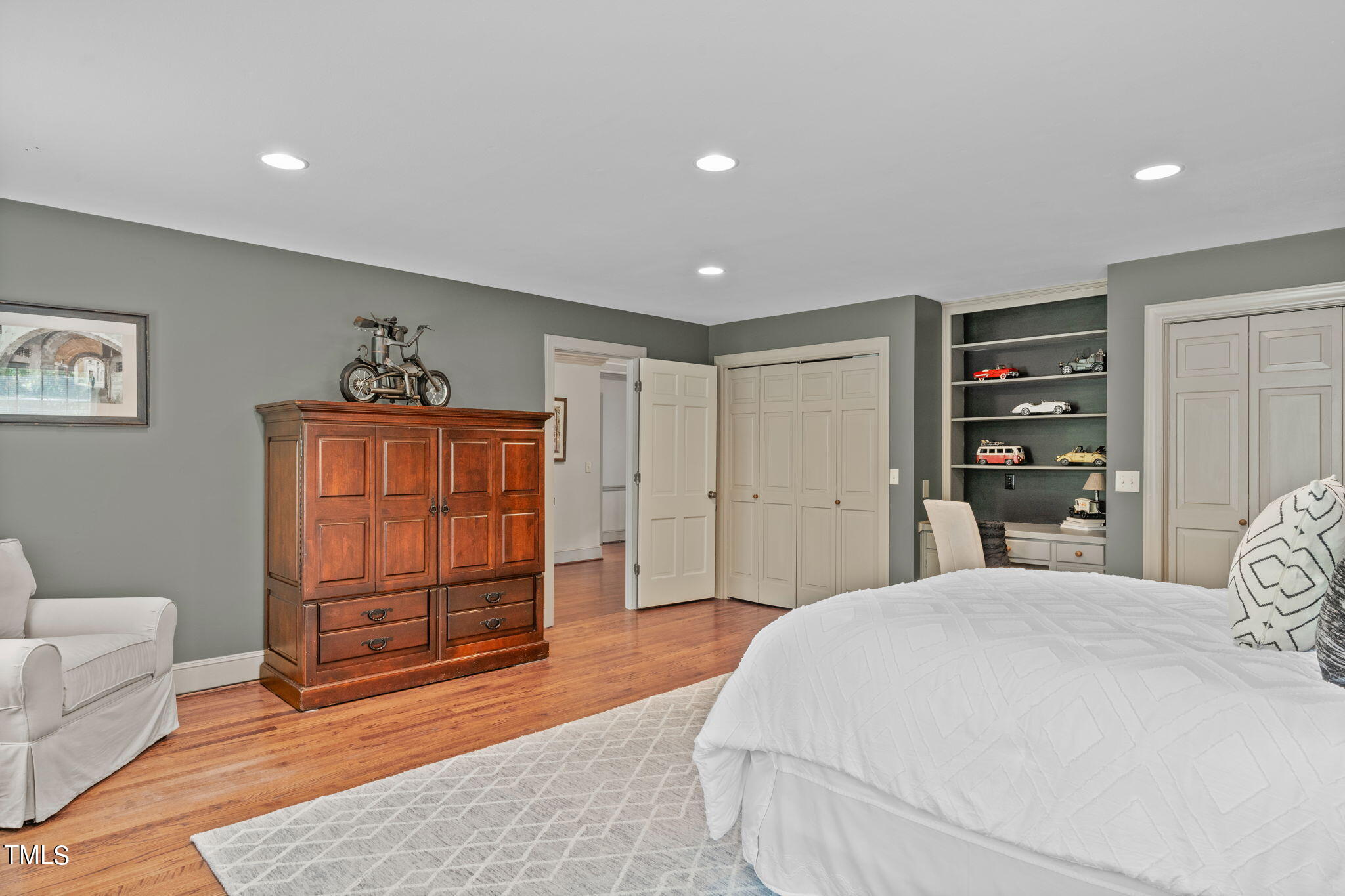 3919 Regent Road Durham, NC 27707 - Photo 54 of 87 a spacious bedroom with a bed and a couch
