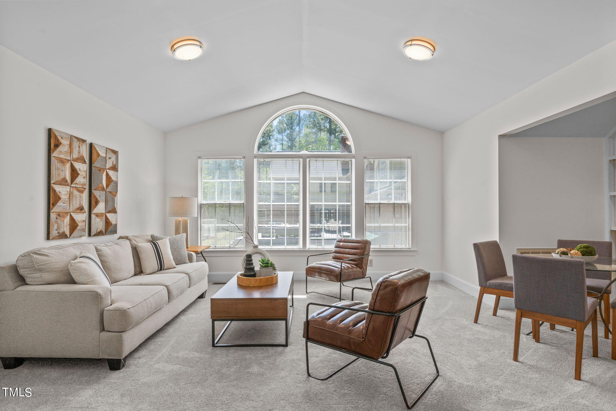 3919 Regent Road Durham, NC 27707 - Photo 64 of 87 a living room with furniture and a large window