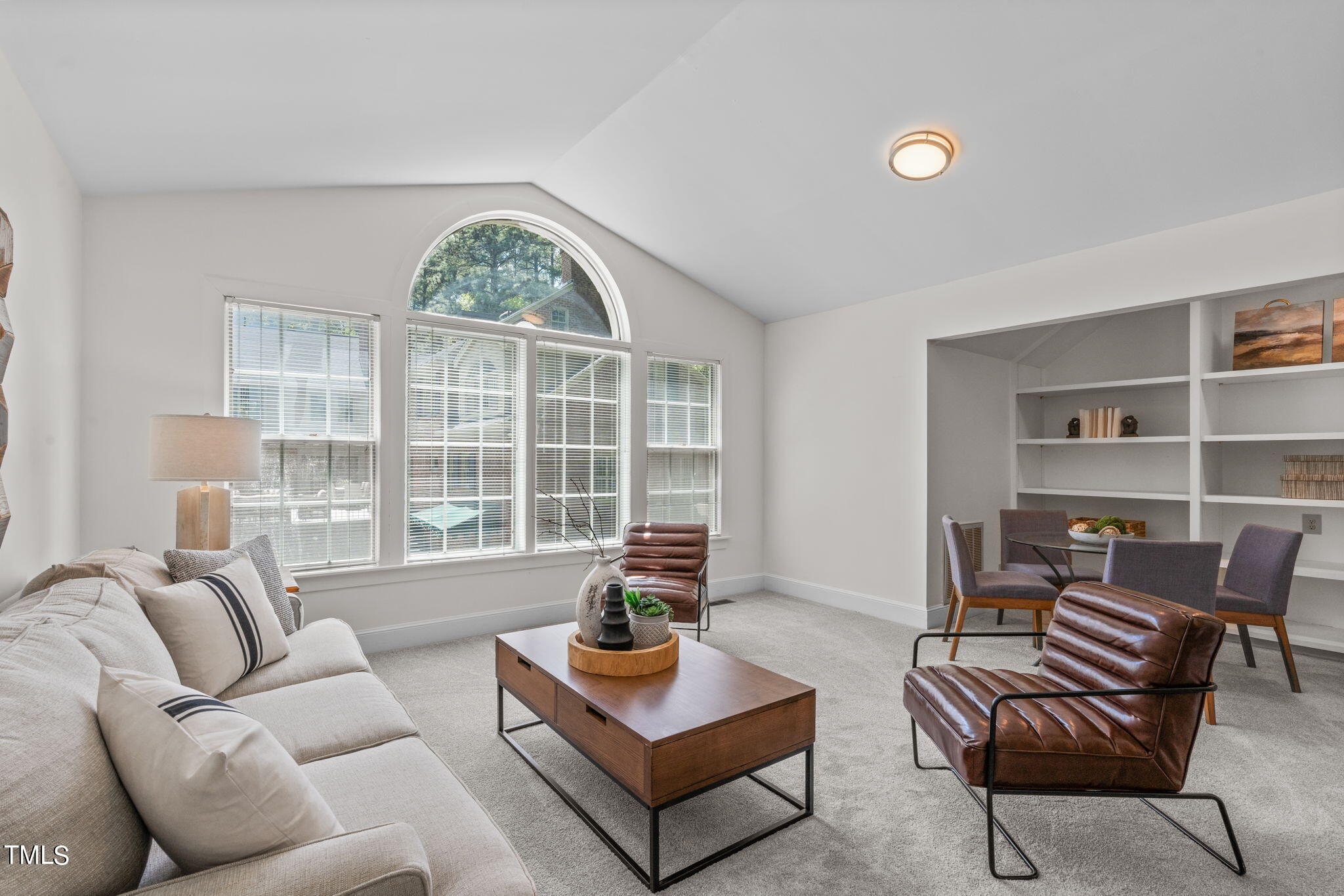 3919 Regent Road Durham, NC 27707 - Photo 65 of 87 a living room with furniture and a large window