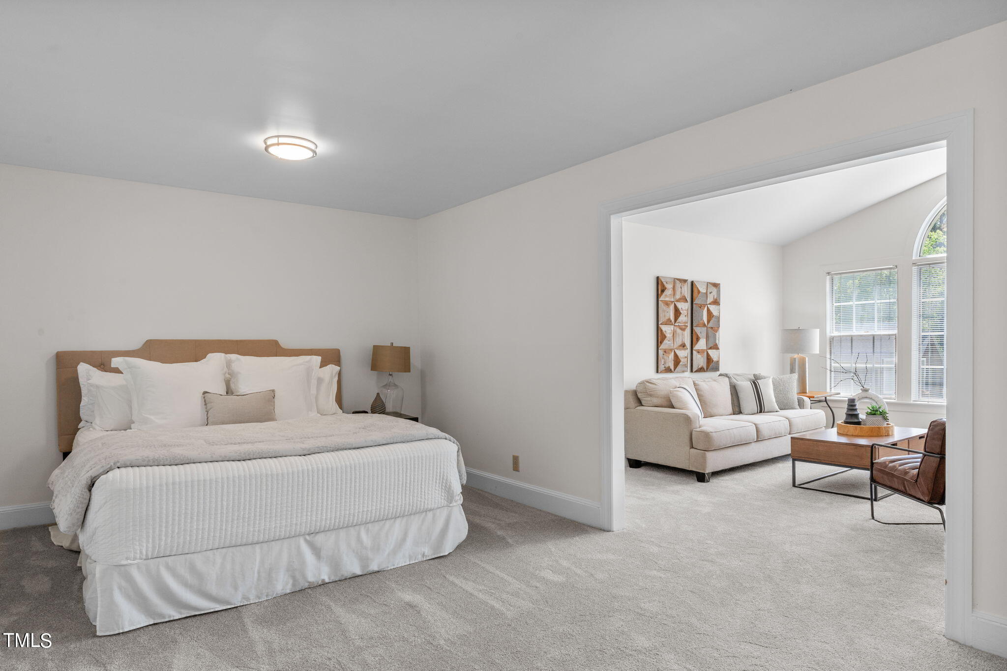 3919 Regent Road Durham, NC 27707 - Photo 69 of 87 a bedroom with a bed and a couch