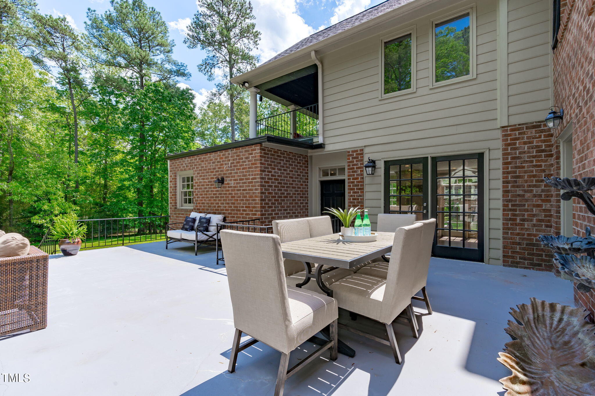 3919 Regent Road Durham, NC 27707 - Photo 71 of 87 a view of a patio with a table and chairs